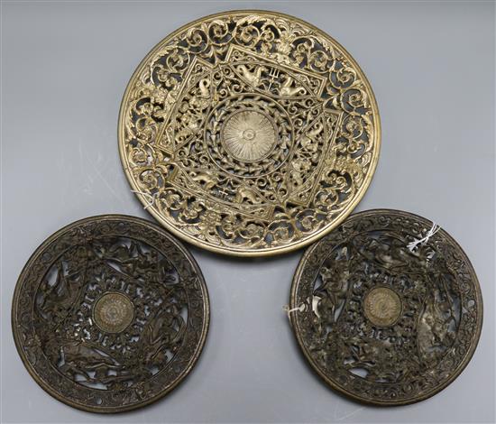Three 19th century German cast iron dishes largest diameter 30cm